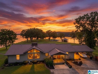 Welcome home to this stunning lakefront retreat! Situated on 4 - photo 2