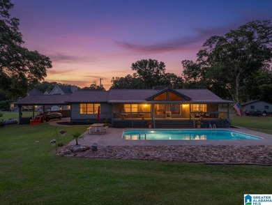 Welcome home to this stunning lakefront retreat! Situated on 4 - photo 3