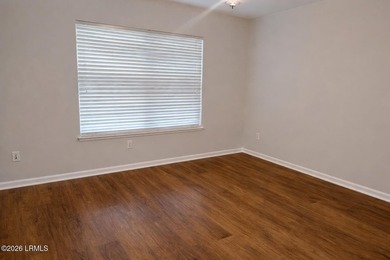 Light-filled one-level end unit in Sun City, tucked away on a - photo 14