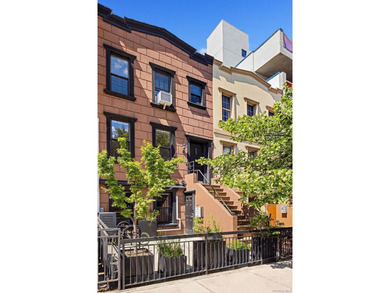 Set on a picturesque tree-lined block in the heart of Bed-Stuy - photo 14