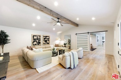 Nestled on a rare private flat lot along Sicomoro Drive in the - photo 13