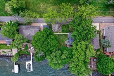Perfectly positioned on the south shore of Lake Kegonsa, this - photo 13