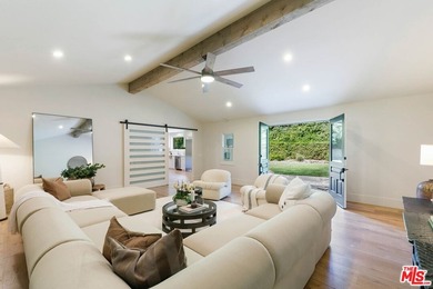 Nestled on a rare private flat lot along Sicomoro Drive in the - photo 14