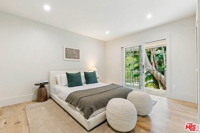 Nestled on a rare private flat lot along Sicomoro Drive in the - photo 22