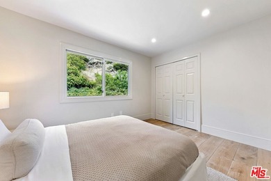 Nestled on a rare private flat lot along Sicomoro Drive in the - photo 25