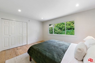 Nestled on a rare private flat lot along Sicomoro Drive in the - photo 27