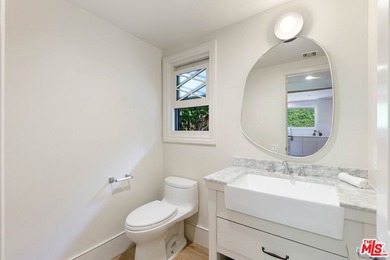 Nestled on a rare private flat lot along Sicomoro Drive in the - photo 33
