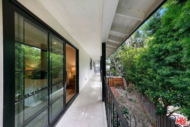 Nestled on a rare private flat lot along Sicomoro Drive in the - photo 39