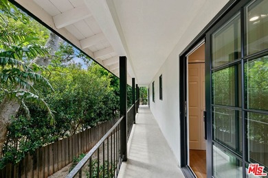 Nestled on a rare private flat lot along Sicomoro Drive in the - photo 40