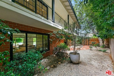 Nestled on a rare private flat lot along Sicomoro Drive in the - photo 41