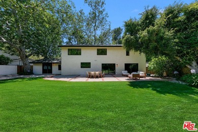 Nestled on a rare private flat lot along Sicomoro Drive in the - photo 42