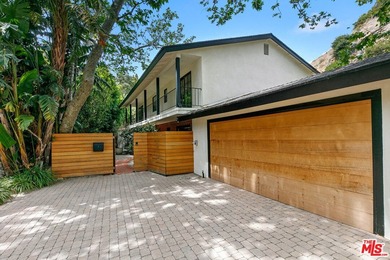 Nestled on a rare private flat lot along Sicomoro Drive in the - photo 48