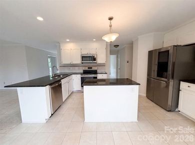 Welcome to 417 Vincent Ct, a residence designed for practical - photo 17