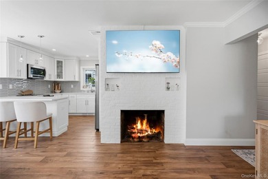Welcome to this beautifully updated sprawling ranch in the - photo 11