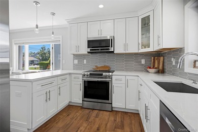 Welcome to this beautifully updated sprawling ranch in the - photo 18