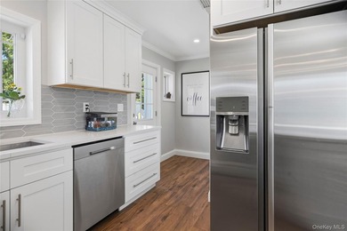 Welcome to this beautifully updated sprawling ranch in the - photo 20