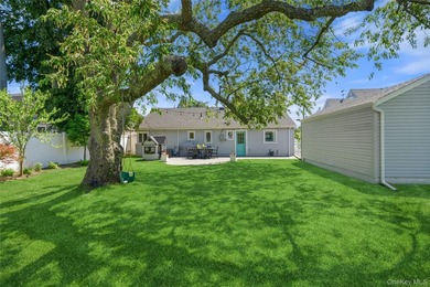 Welcome to this beautifully updated sprawling ranch in the - photo 32