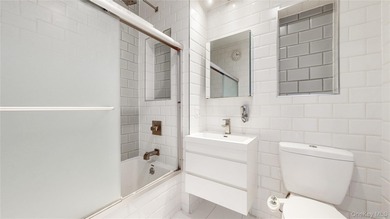 Welcome to unit 3B at 244 Franklin Avenue, set in one of