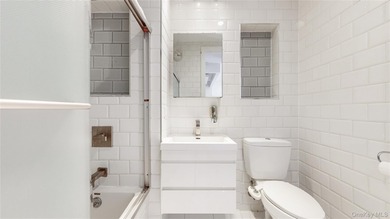 Welcome to unit 3B at 244 Franklin Avenue, set in one of