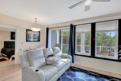 From this third floor covered balcony, enjoy beautiful views of - photo 14