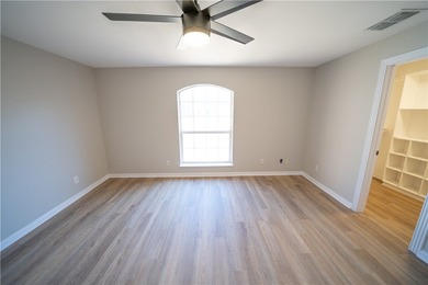 Step into this beautifully refreshed four-sided brick home - photo 17