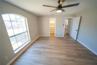 Step into this beautifully refreshed four-sided brick home - photo 18