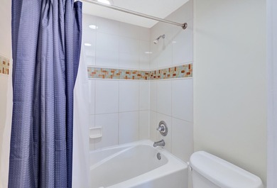 From this third floor covered balcony, enjoy beautiful views of - photo 20