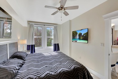 From this third floor covered balcony, enjoy beautiful views of - photo 21