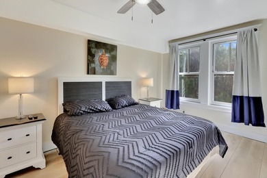 From this third floor covered balcony, enjoy beautiful views of - photo 22