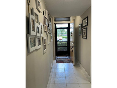 Discover this delightful first-floor unit in the sought-after - photo 5