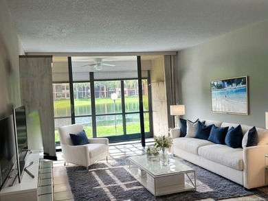 Discover this delightful first-floor unit in the sought-after - photo 9