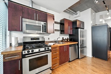 Welcome to The Mosaic! Live in a unique contemporary condo open