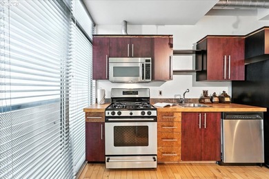 Welcome to The Mosaic! Live in a unique contemporary condo open