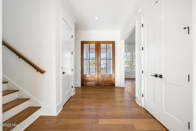 Elegant New Construction! This exquisite 3 story residence