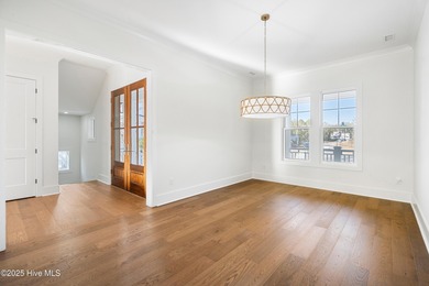 Elegant New Construction! This exquisite 3 story residence