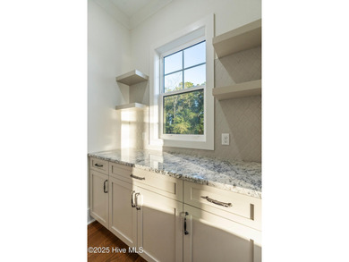 Elegant New Construction! This exquisite 3 story residence