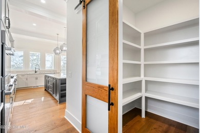 Elegant New Construction! This exquisite 3 story residence