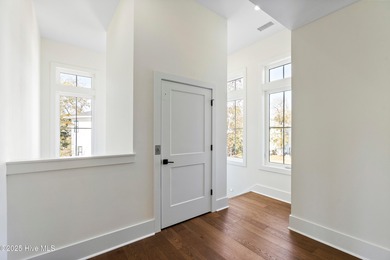 Elegant New Construction! This exquisite 3 story residence