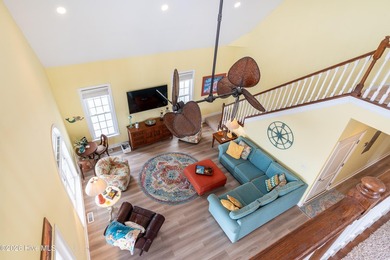 Experience the ultimate in coastal living at this custom-built