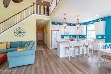Experience the ultimate in coastal living at this custom-built