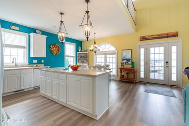 Experience the ultimate in coastal living at this custom-built