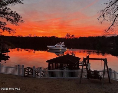 Located in the prestigious, gated waterfront community of - photo 4