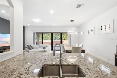Discover elevated living in a striking modern residence in the - photo 15