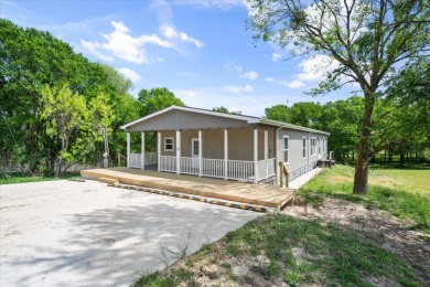 Well Maintained Manufactured home at RC LAKE! - photo 1