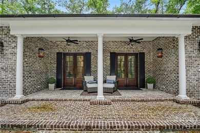 Tucked beneath a canopy of majestic live oaks draped in Spanish - photo 7