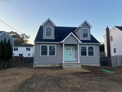 Brand-new custom Cape Cod home offering East End living with a - photo 1