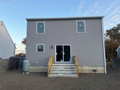 Brand-new custom Cape Cod home offering East End living with a - photo 2