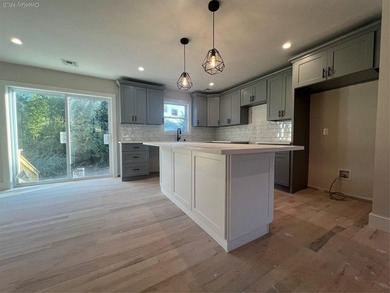 Brand-new custom Cape Cod home offering East End living with a - photo 7