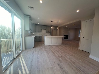Brand-new custom Cape Cod home offering East End living with a - photo 8