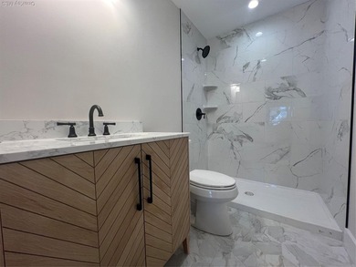 Brand-new custom Cape Cod home offering East End living with a - photo 9
